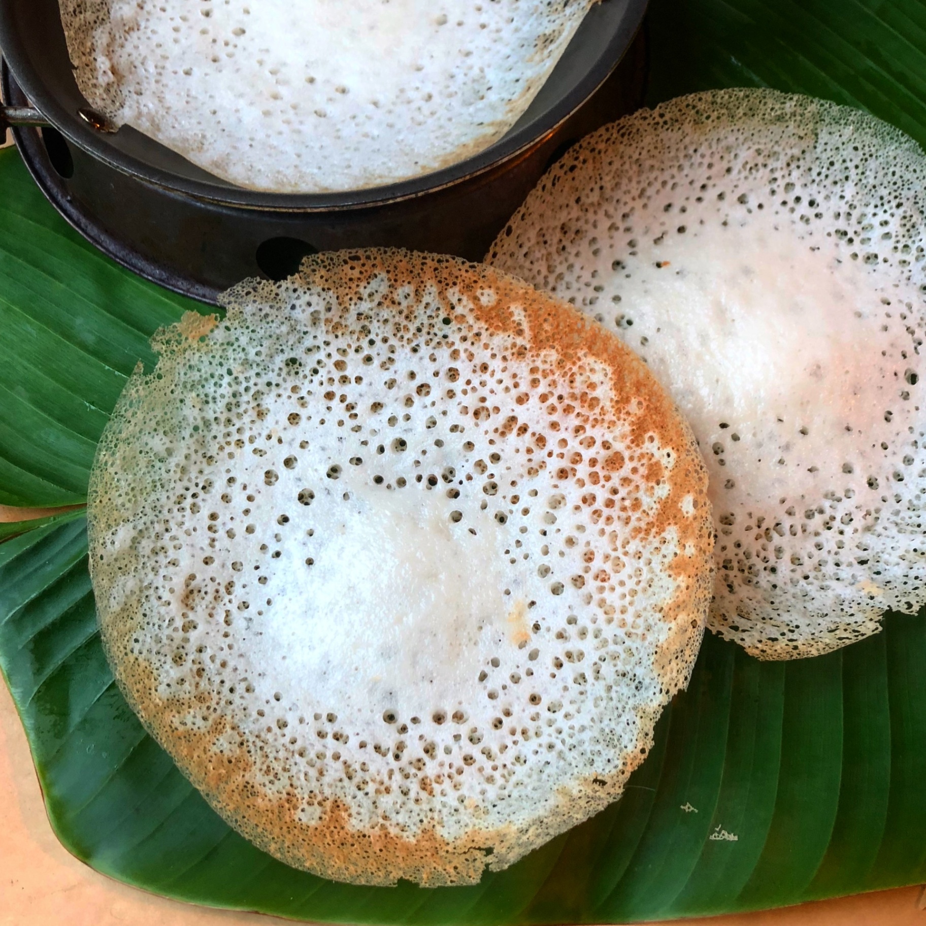 Appam. Served at Café Malabar, authentic Kerala & Malabar restaurant at 142 Arab Street, Singapore.